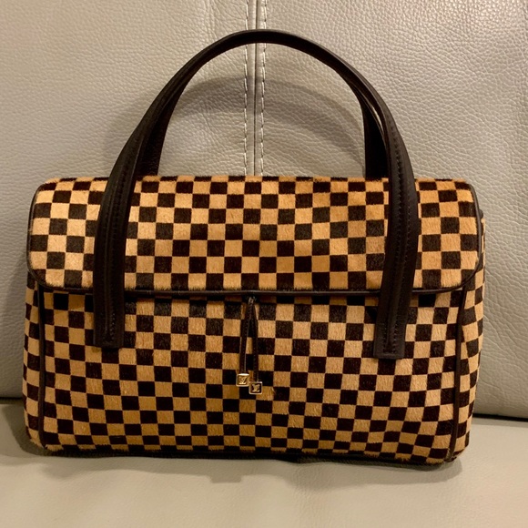 Louis Vuitton Handbags - Louis Vuitton *RARE* Damier Sauvage Lionne